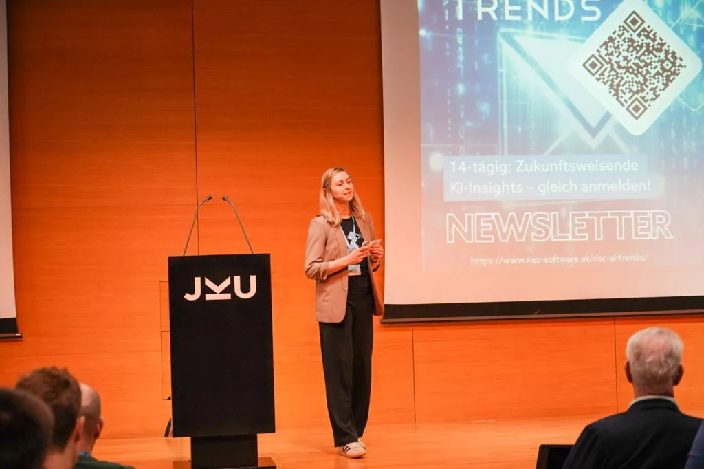 Präsentation in einem Konferenzraum.